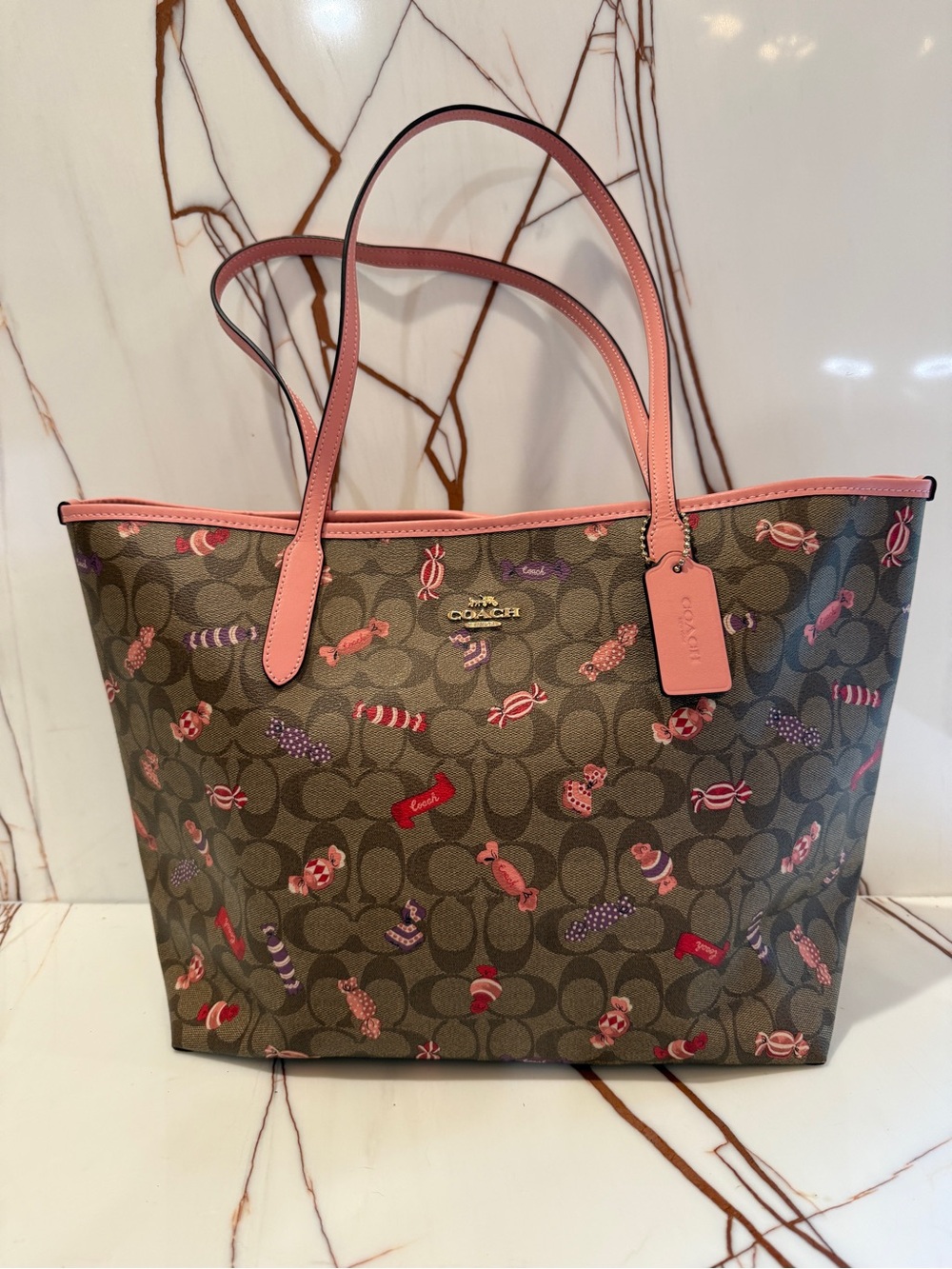 Coach Brown Signature Tote with Pink Trim and Candy Print